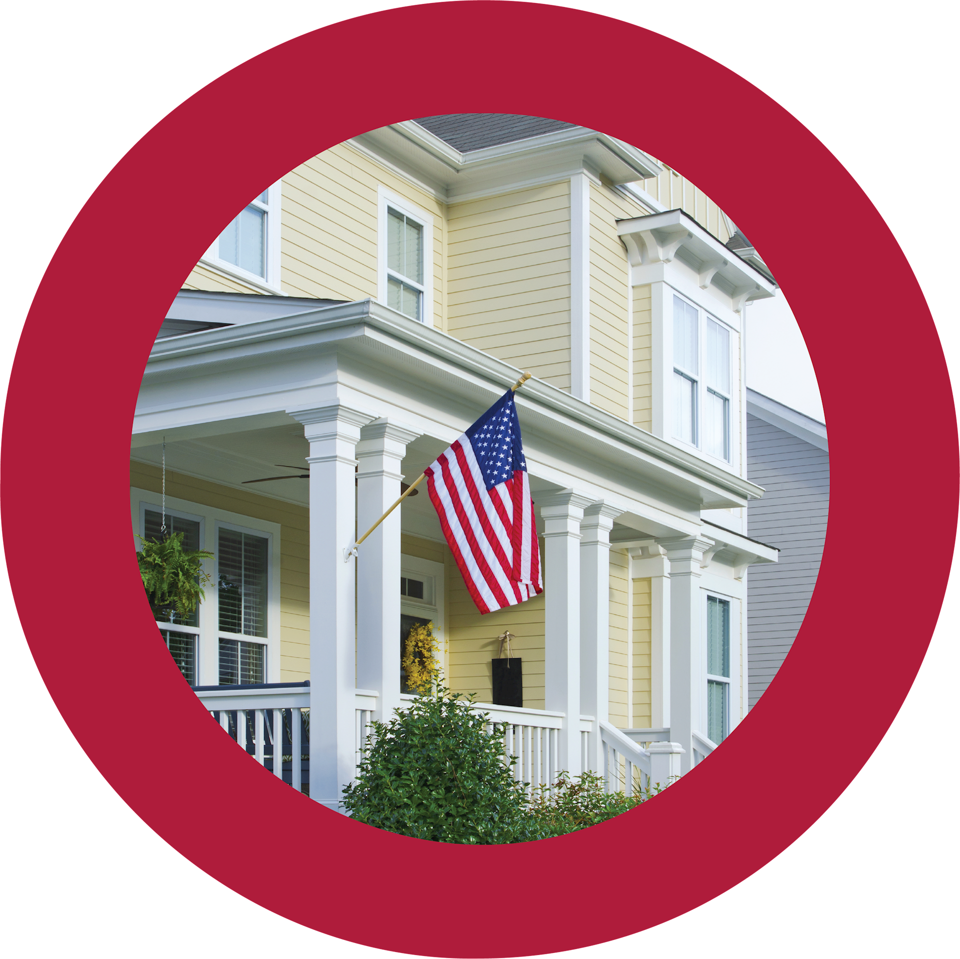 A yellow, two-story house with an American flag.