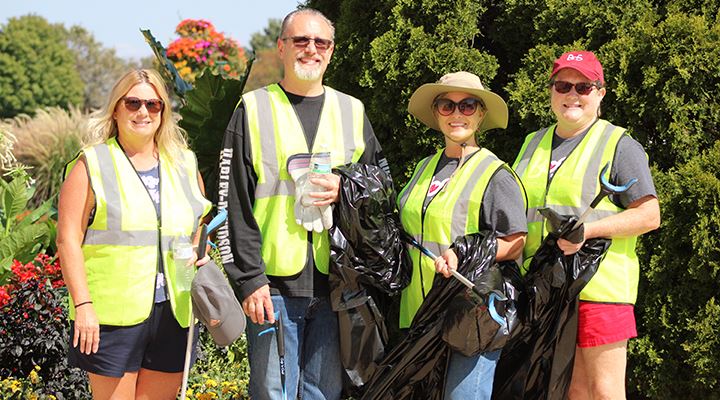 BOS employees volunteer for a clean-up day in Springfield, IL with Adop-A-Highway.