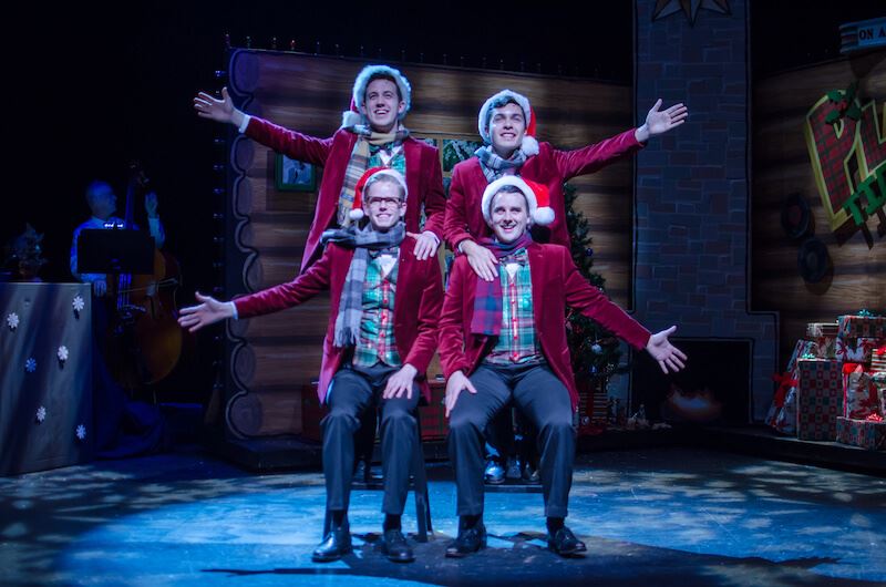 Photo of the four men from the Plaid Tidings musical.